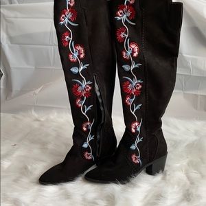 Carols over the knee boots.